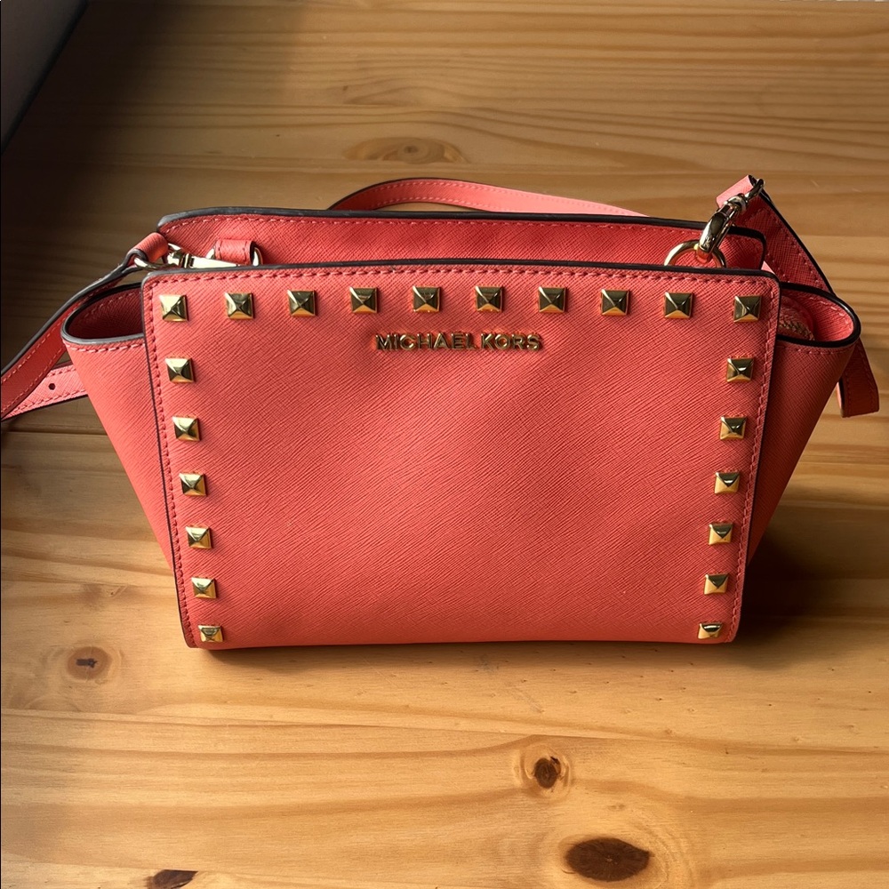 Michael Kors coral pink crossbody bag studded